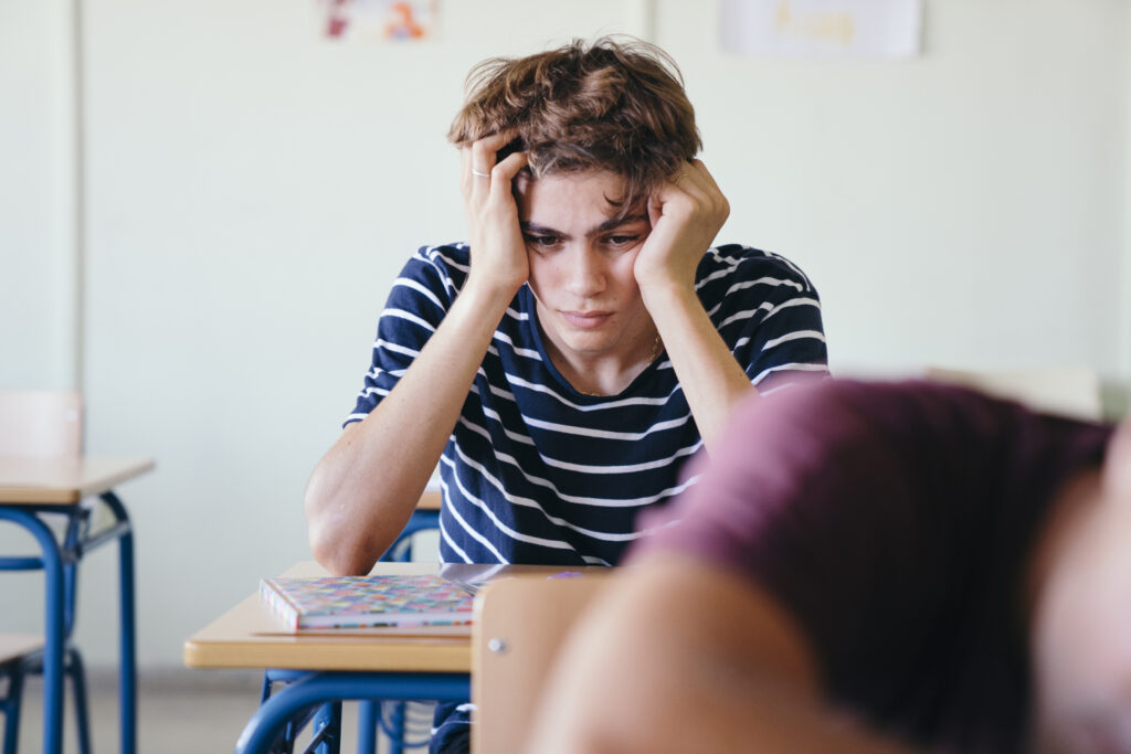 Worried Youngster in Classroom