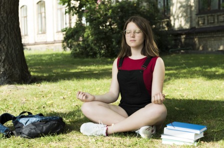 Meditating High School Girl after Exams