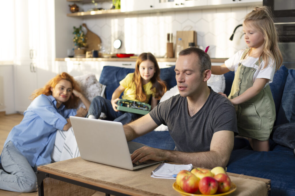 Parent Trying Work from Home Surrounded by Kids