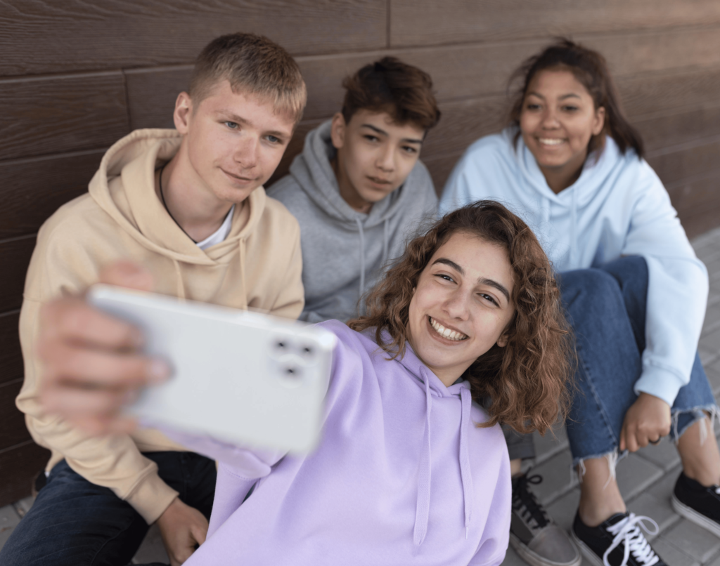 Teenager Friends Taking Selfie Outdoors