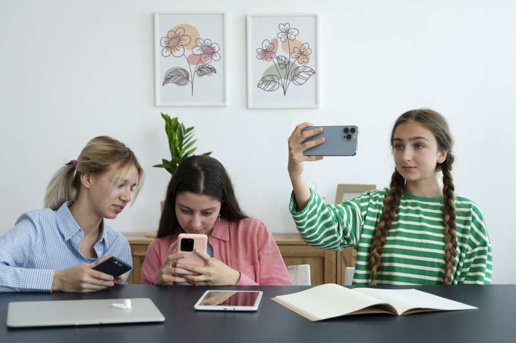 Teenagers Shots with Smartphones in Art Room