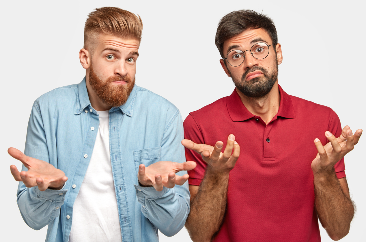 Two bearded guys with clueless hesitant expression spread palms bewilderment Why Comparison with others is a Problem